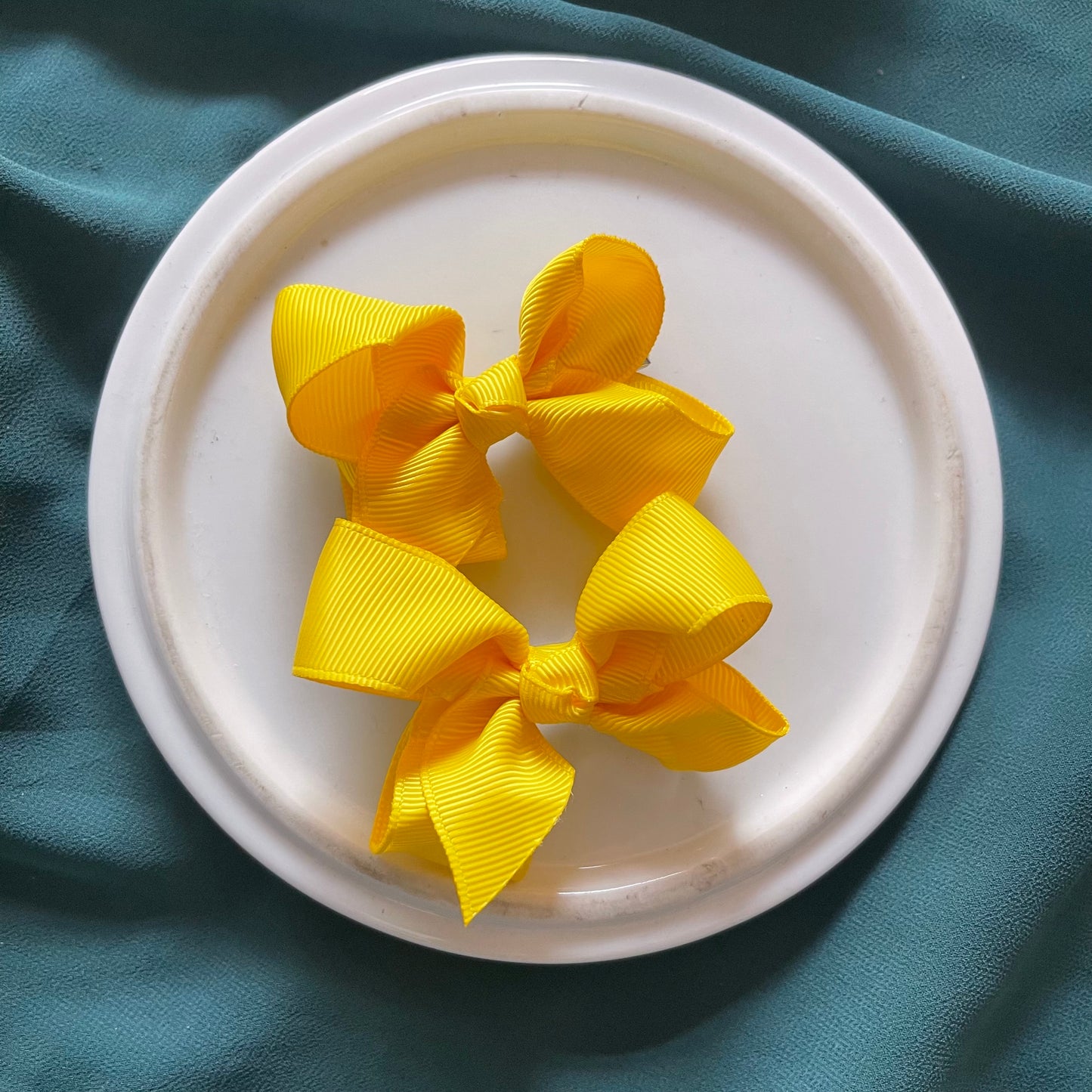 3 inch solid yellow bows pair