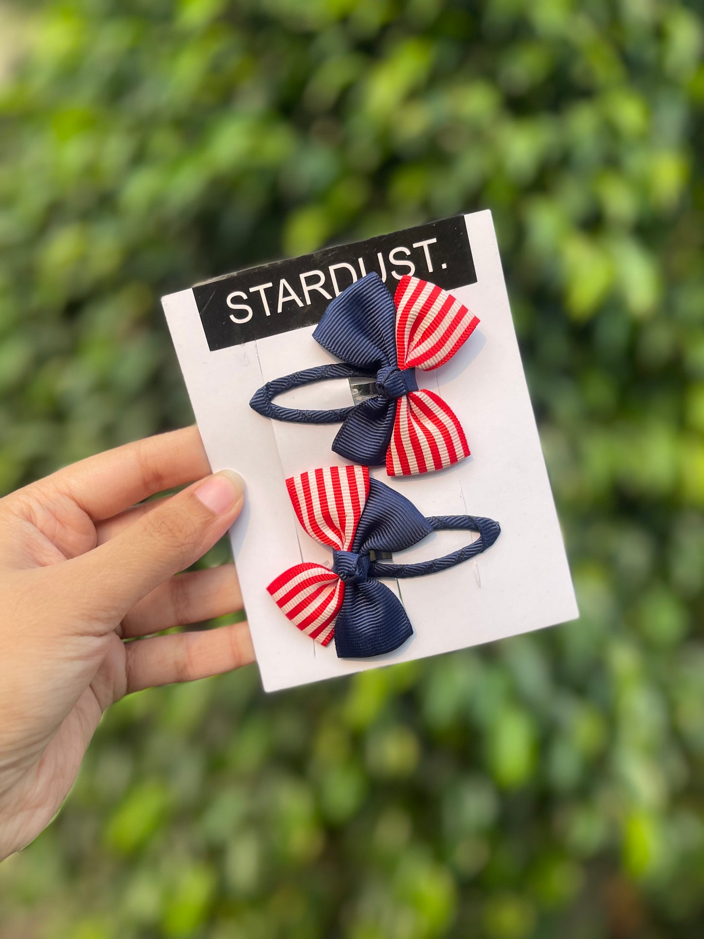 Red and blue lining bow snapclips