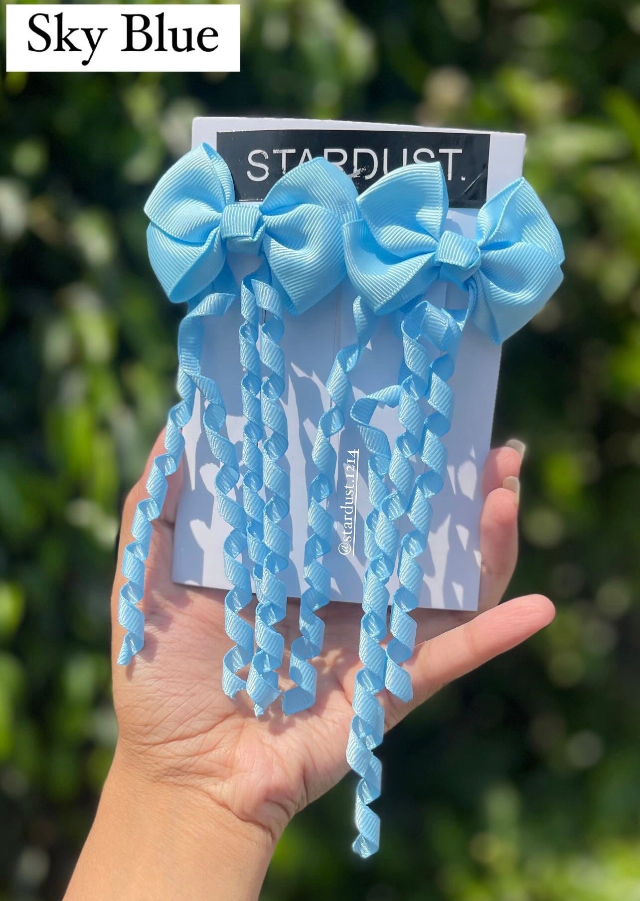 Spiral hanging ribbon clipons