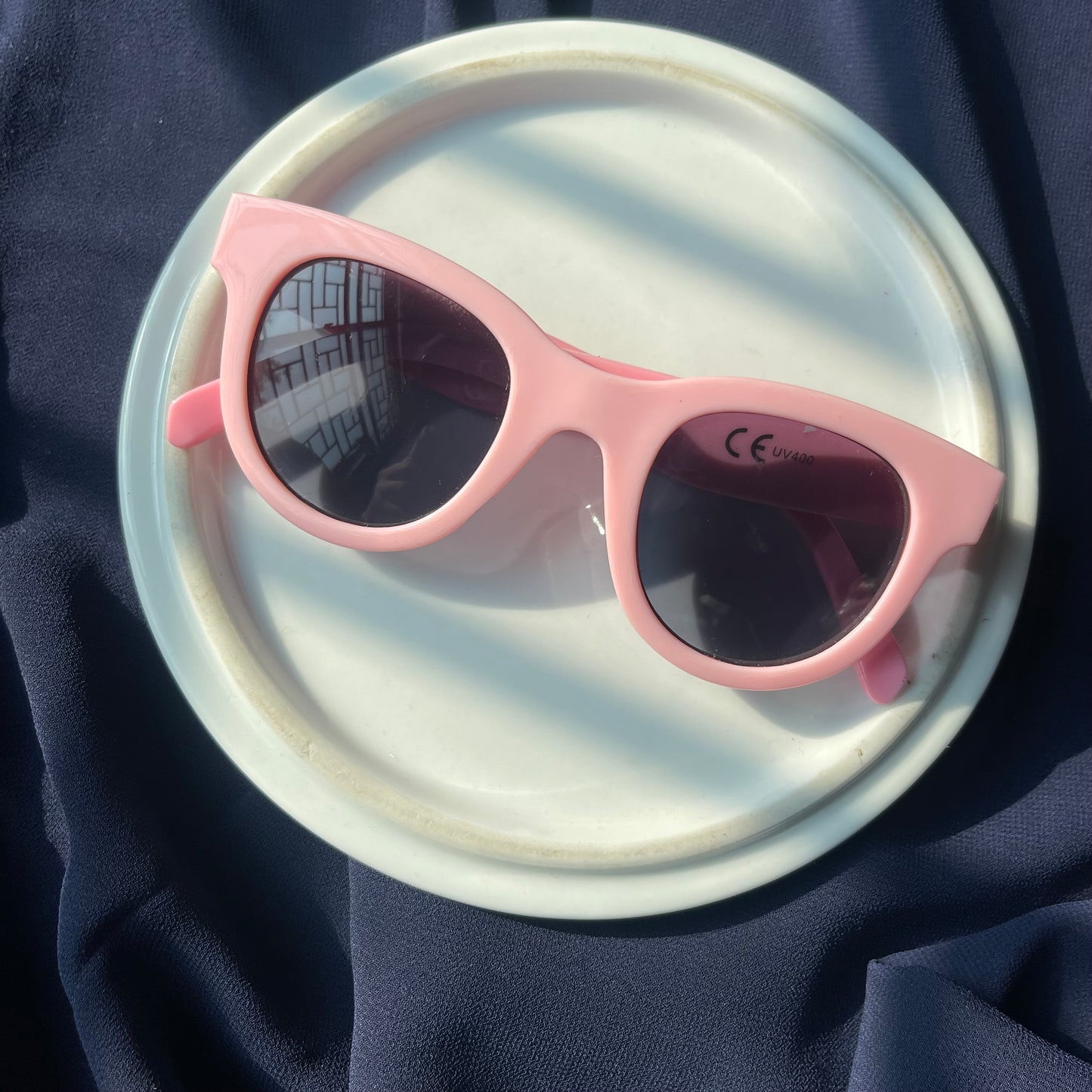 Pink thick rimmed unicorn sunnies