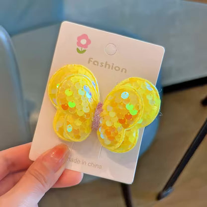 Sequined butterfly clipon pairs