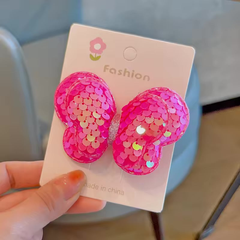 Sequined butterfly clipon pairs