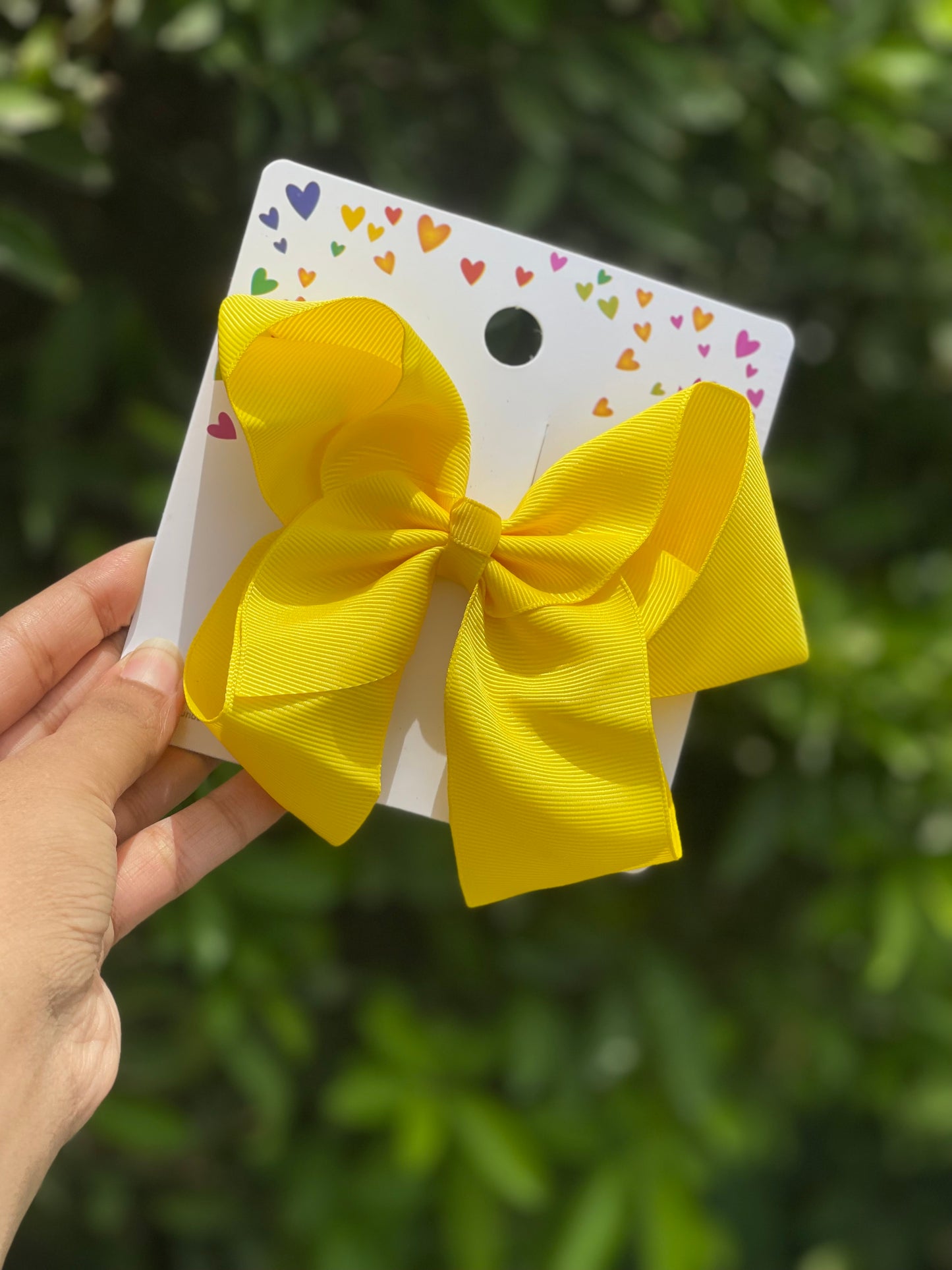 Solid yellow bow