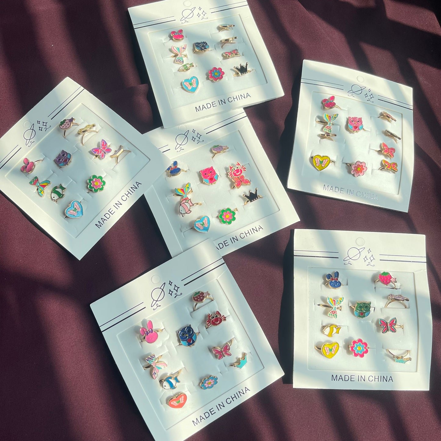 Metallic adjustable random kiddy character rings 10pc pack 🔥