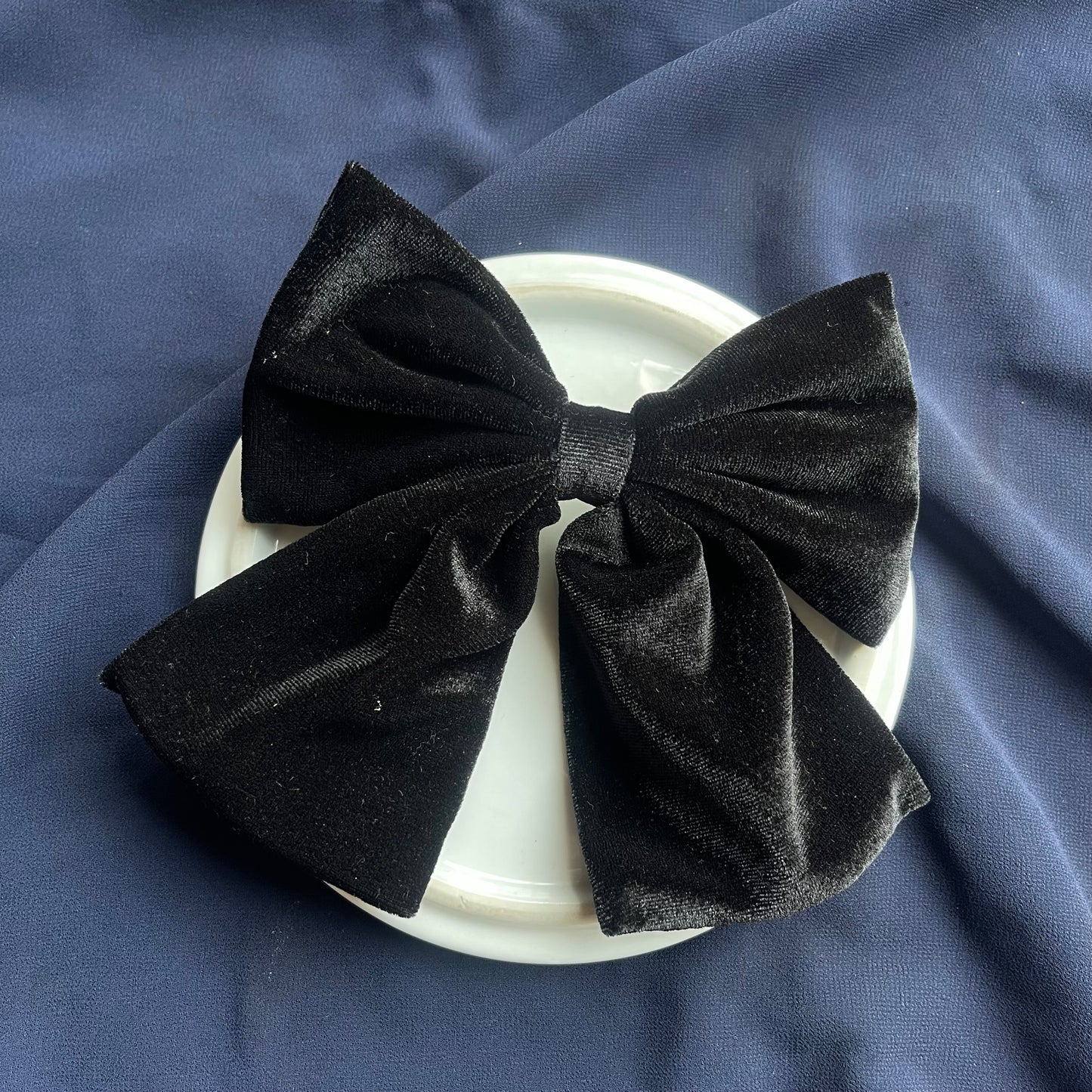 Black velvet hanging bow